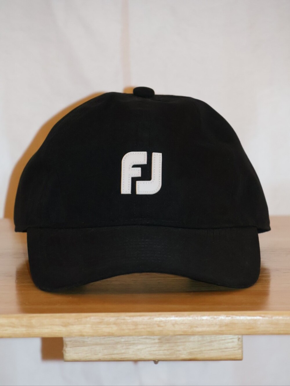FootJoy DryJoys Black & White Waterproof Baseball Rain Cap.